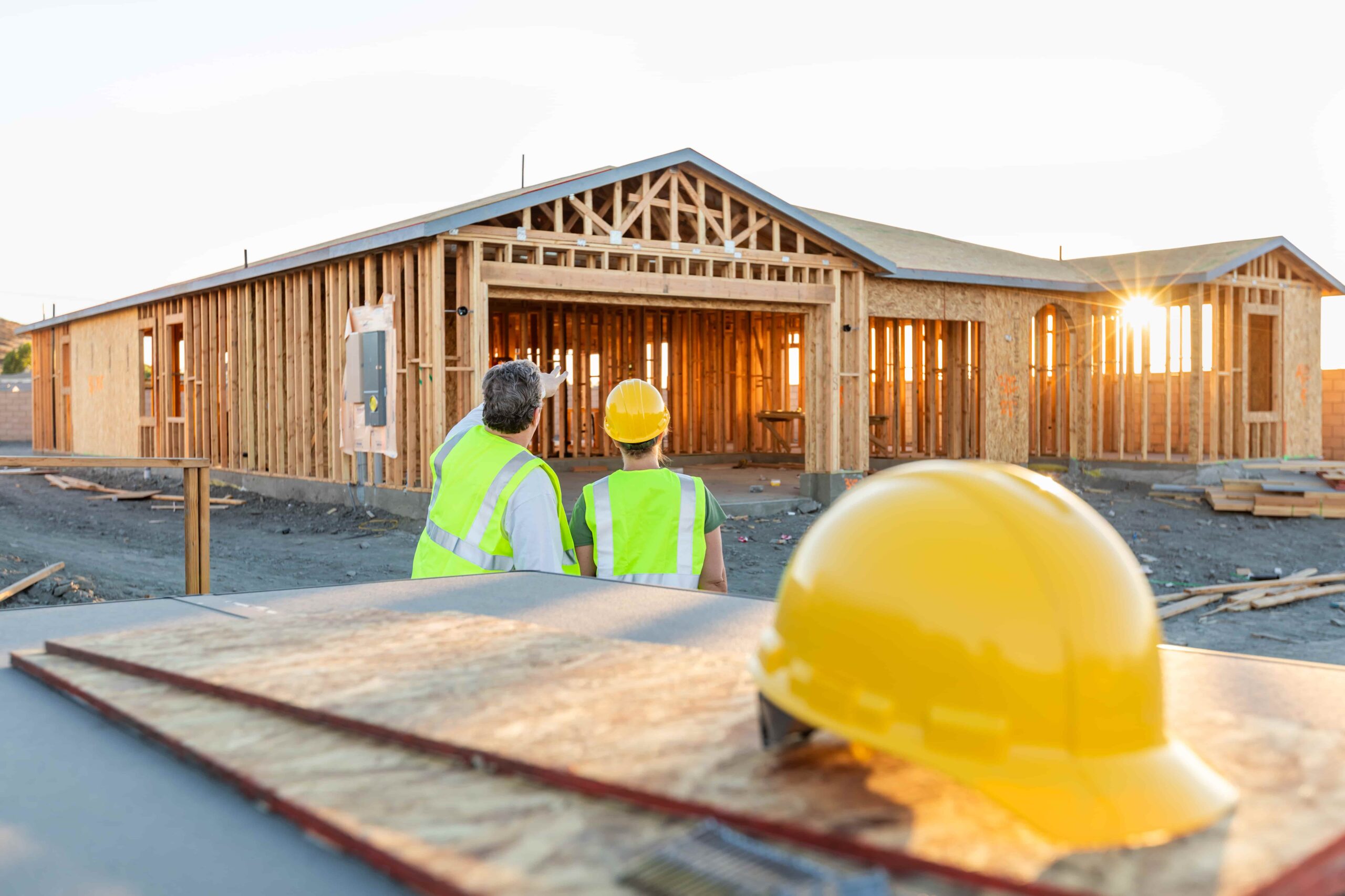 male-and-female-construction-workers-at-new-home-s-2023-11-27-04-52-15-utc (1)